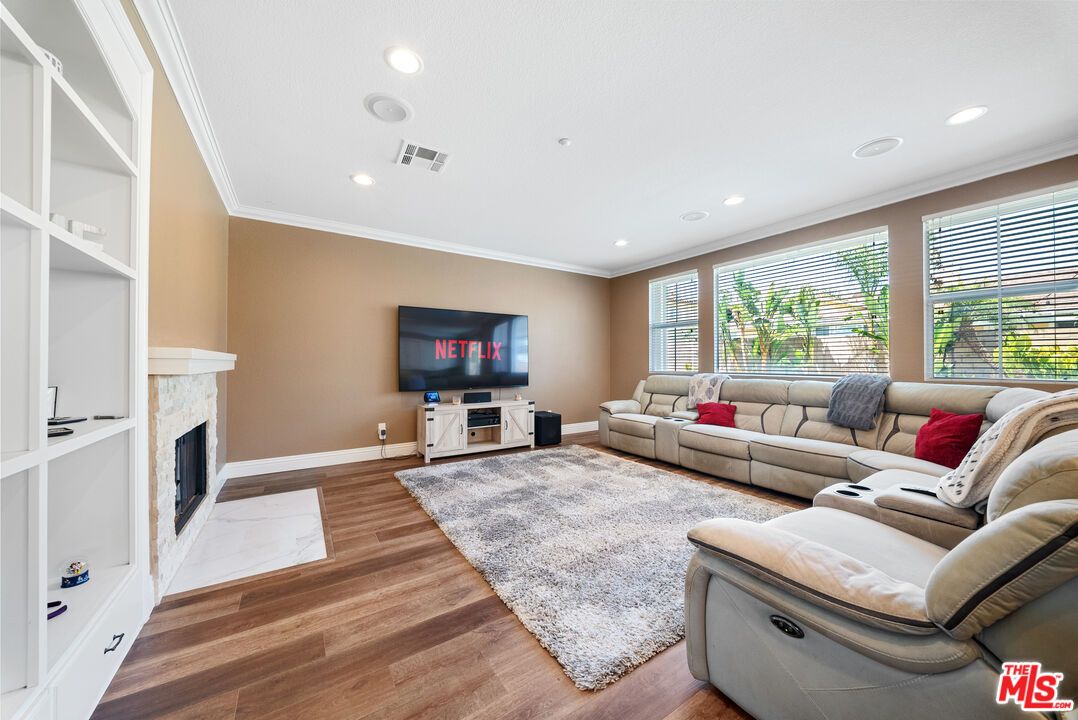 Fireplace, Interior, Living room, Recessed Lighting, Wood Texture Flooring