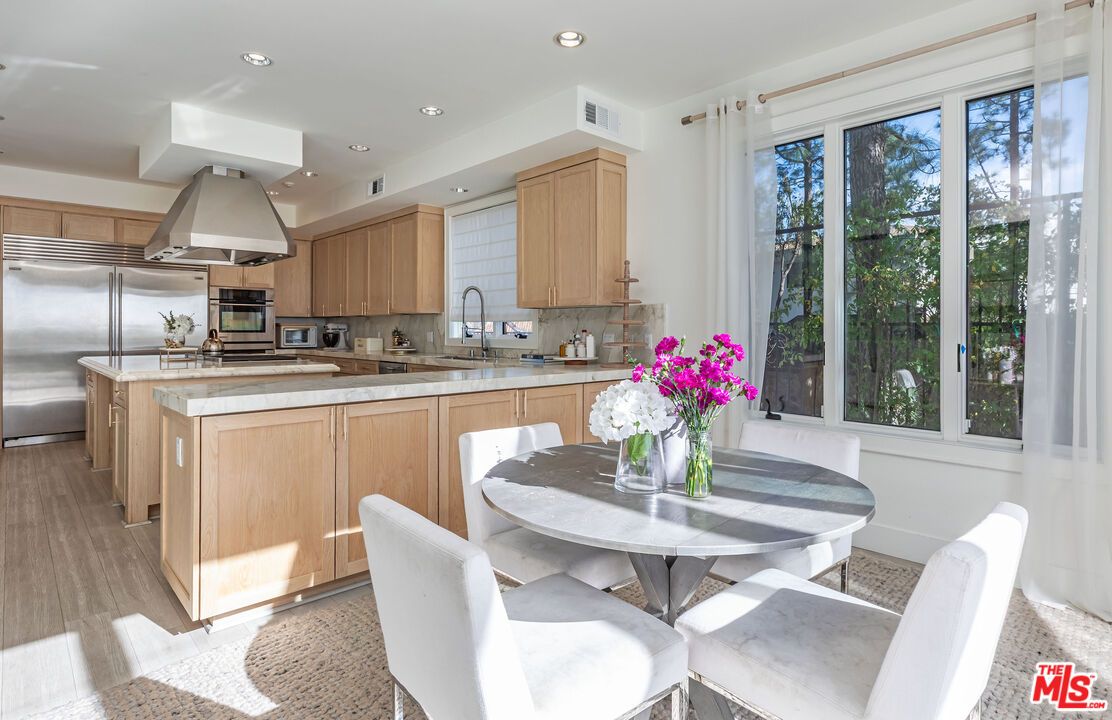 Dining room, Interior, Kitchen, Recessed Lighting, Stainless Steel Appliances, Wood Texture Flooring