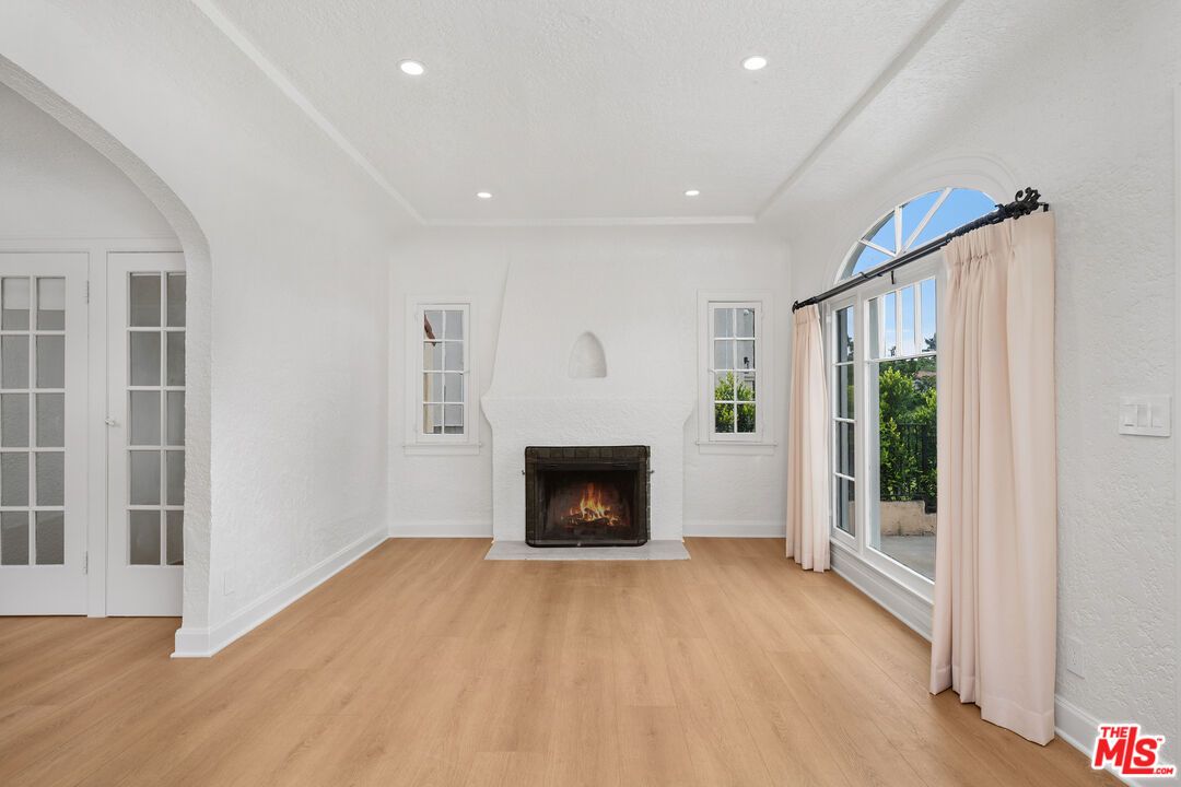 Empty room, Fireplace, Interior, Recessed Lighting, Wood Texture Flooring