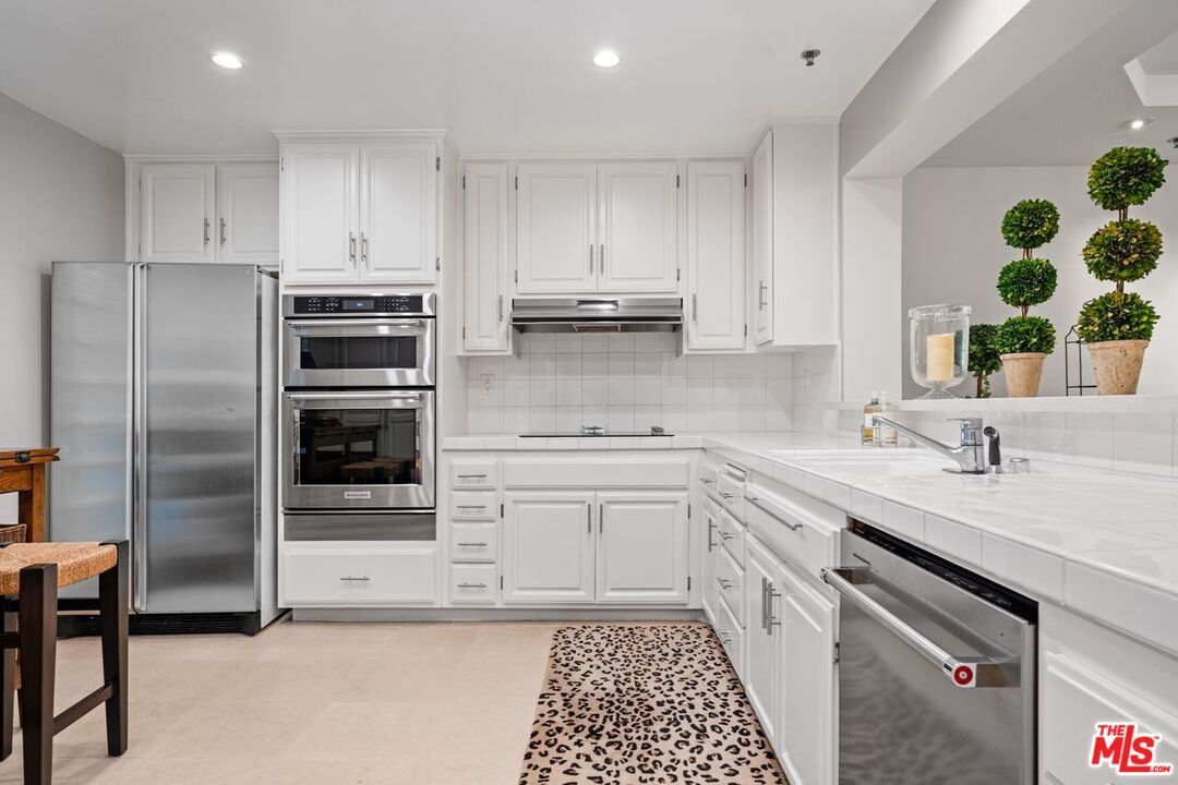 Interior, Kitchen, Recessed Lighting, Stainless Steel Appliances, Tile Countertops