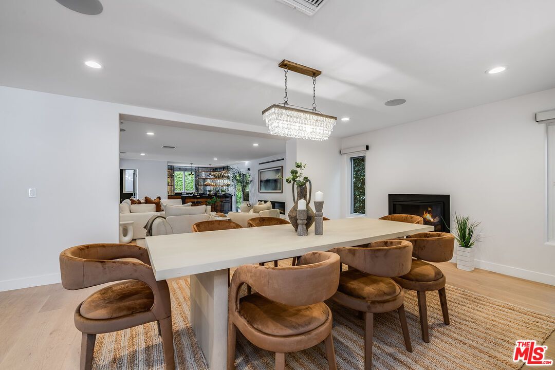 Chandelier, Dining room, Fireplace, Interior, Living room, Recessed Lighting, Wood Texture Flooring