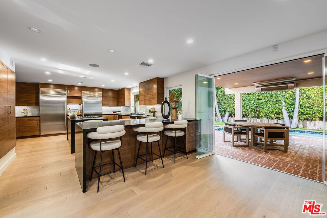 Dining room, Interior, Kitchen, Recessed Lighting, Stainless Steel Appliances, Wood Texture Flooring