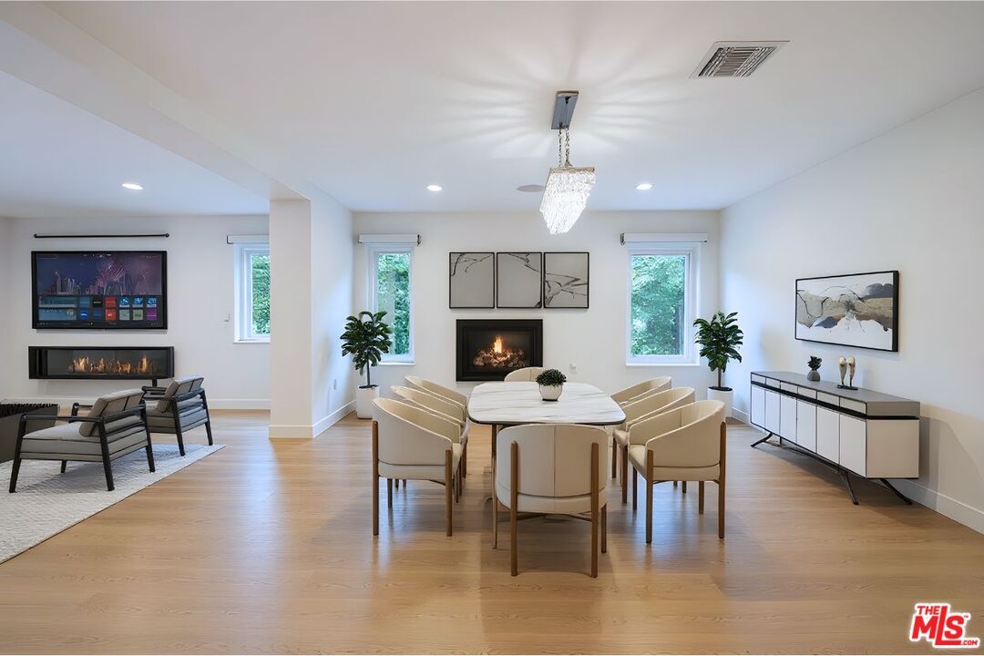 Chandelier, Dining room, Fireplace, Interior, Living room, Recessed Lighting, Wood Texture Flooring