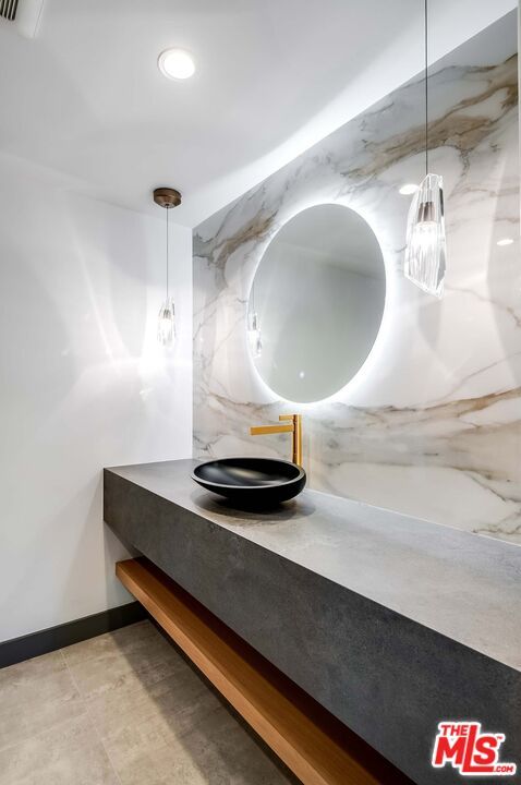 Bathroom, Dual Sink Vanities, Interior, Marble Walls, Pendant Lights, Recessed Lighting