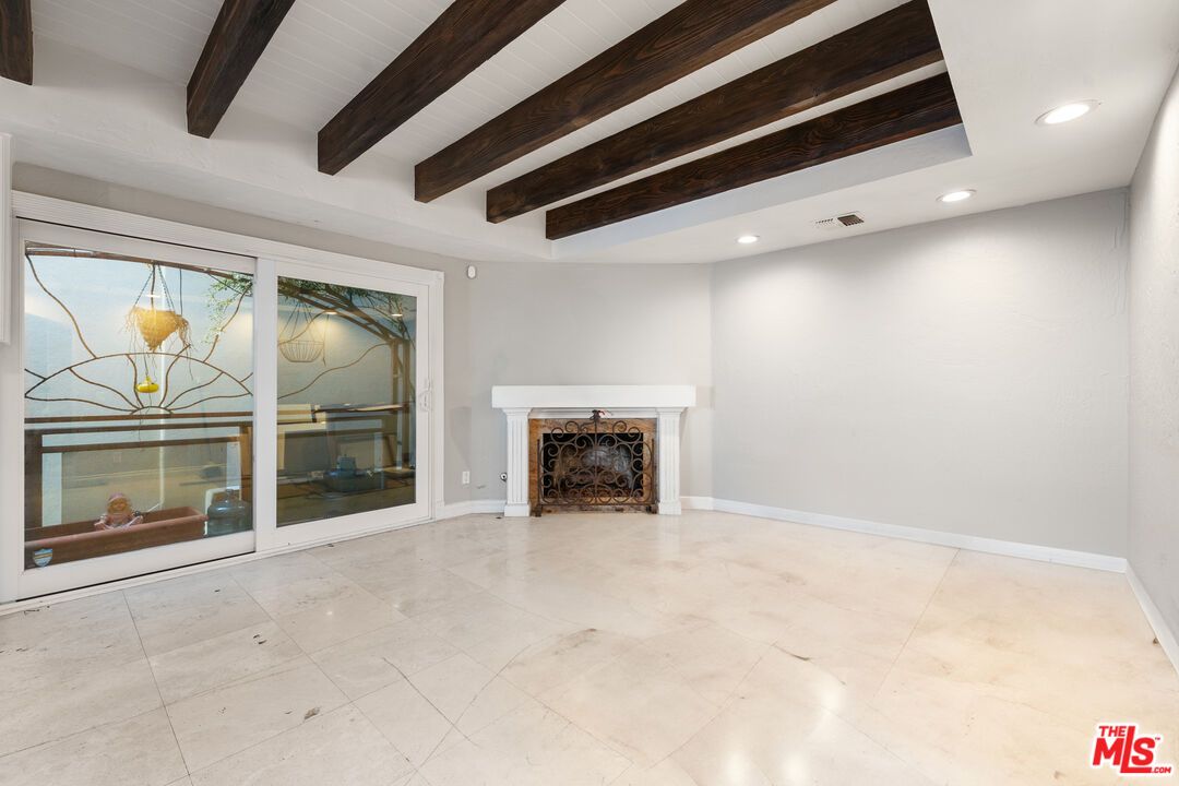 Empty room, Fireplace, Interior, Recessed Lighting, Wooden Beams