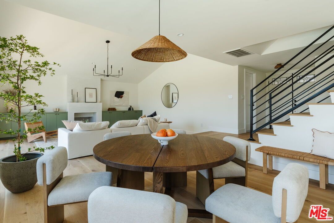 Dining room, Fireplace, Interior, Living room, Pendant Lights, Recessed Lighting, Wood Texture Flooring