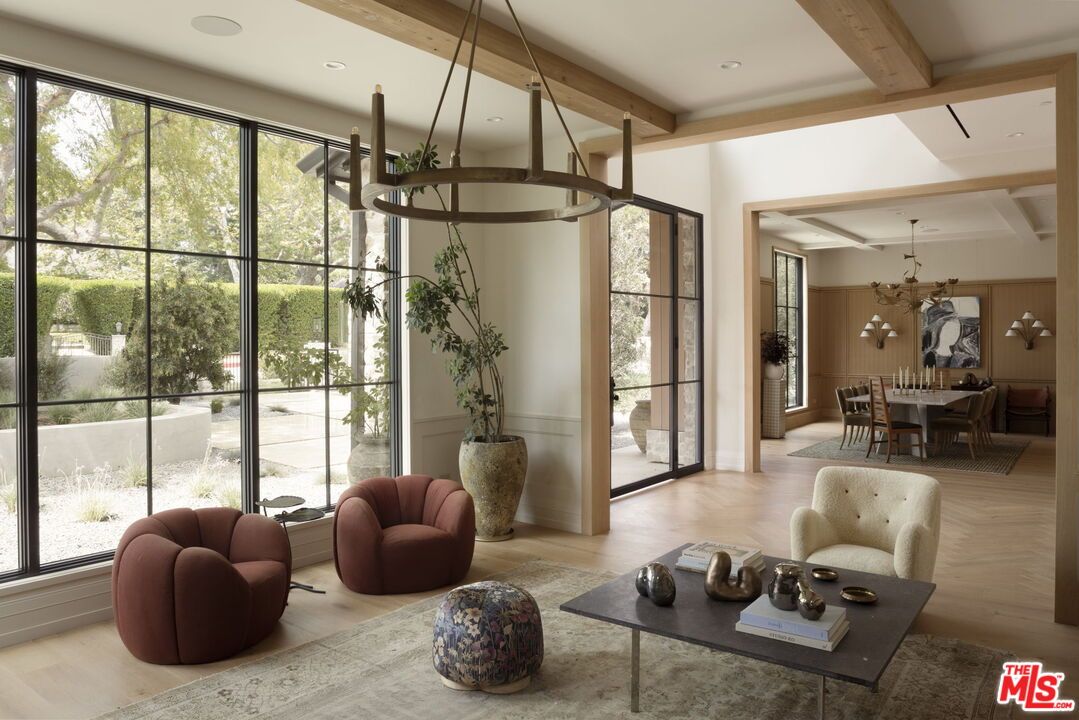 Chandelier, Dining room, Interior, Living room, Pendant Lights, Recessed Lighting, Wooden Beams, Wood Texture Flooring