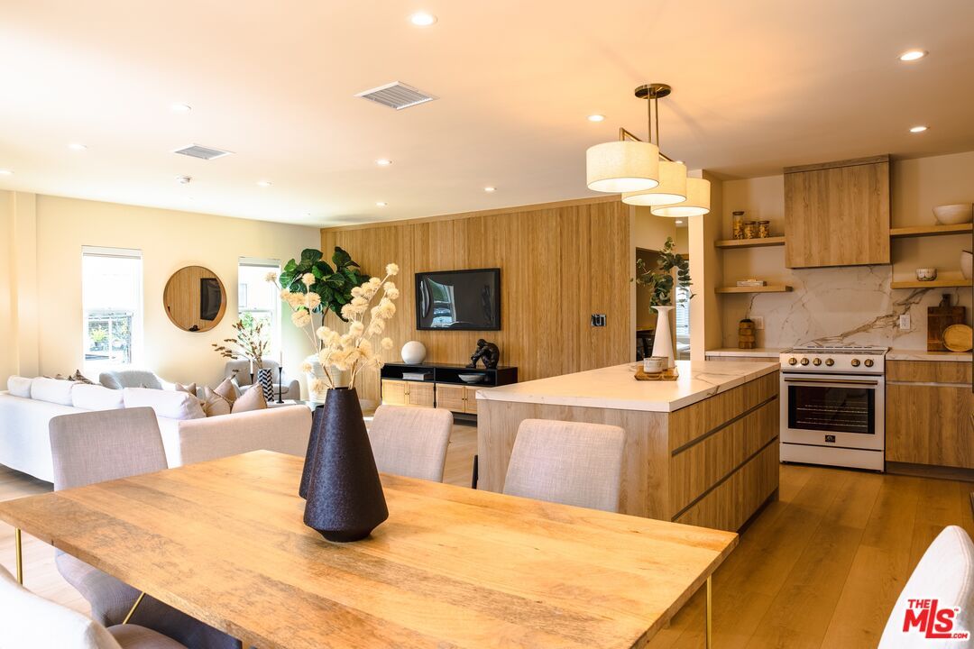 Dining room, Interior, Kitchen, Living room, Pendant Lights, Recessed Lighting, Stainless Steel Appliances, Wood Texture Flooring