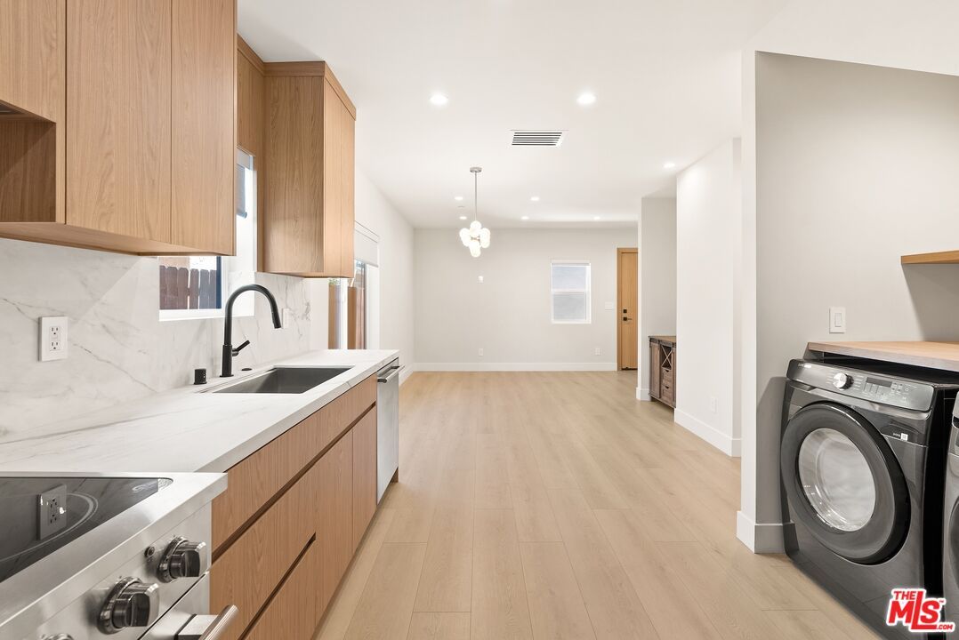 Interior, Kitchen, Pendant Lights, Recessed Lighting, Washer, Wood Texture Flooring