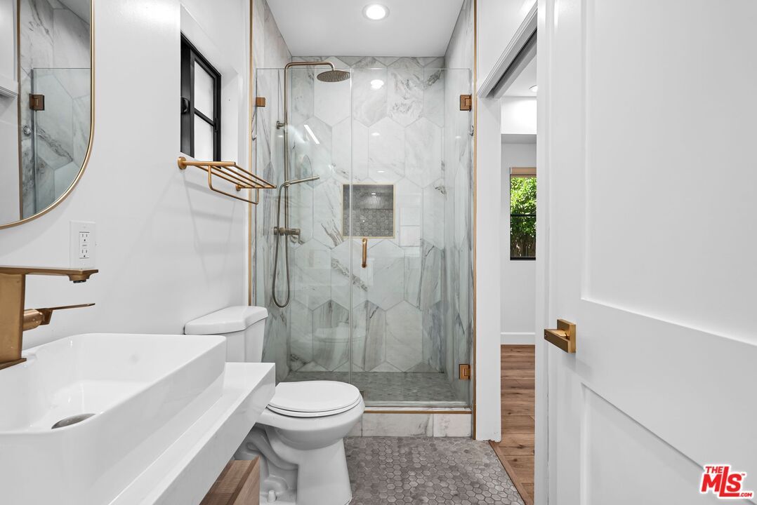 Bathroom, Glass Shower, Interior, Marble Walls, Recessed Lighting, Wood Texture Flooring
