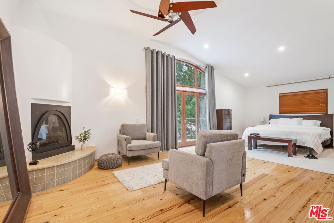 Bedroom, Fireplace, Interior, Recessed Lighting, Wood Texture Flooring