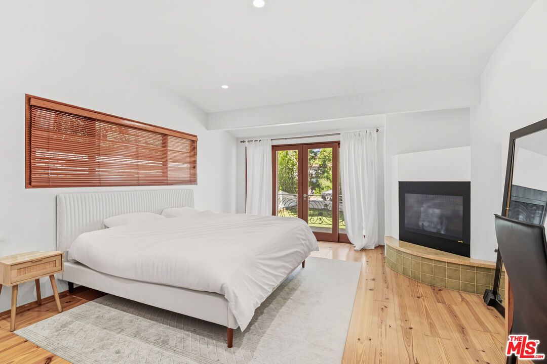 Bedroom, Fireplace, Interior, Recessed Lighting, Wood Texture Flooring