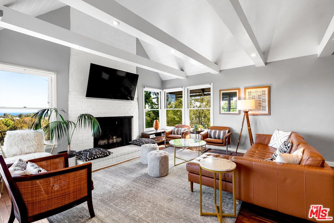 Fireplace, Interior, Living room, Recessed Lighting, Stone Walls, Wood Texture Flooring