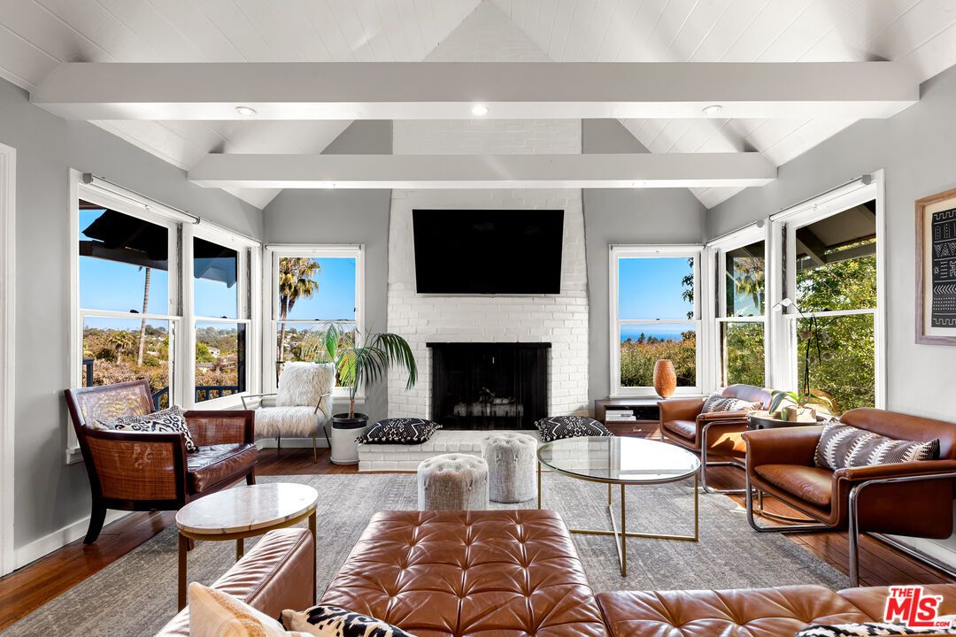 Fireplace, Interior, Living room, Recessed Lighting, Stone Walls, Wood Texture Flooring