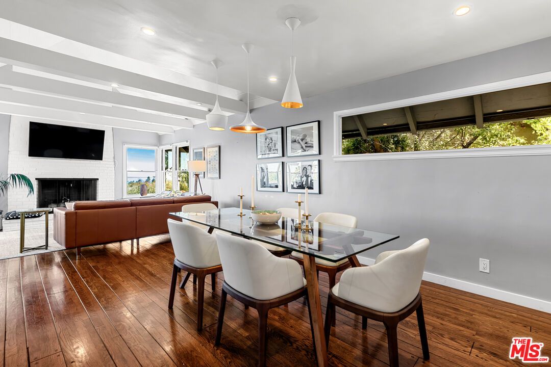 Dining room, Fireplace, Interior, Living room, Pendant Lights, Recessed Lighting, Wood Texture Flooring