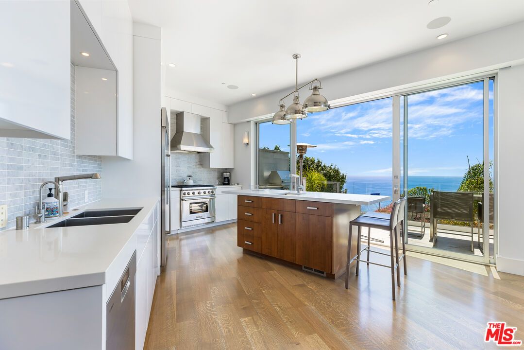 Interior, Kitchen, Pendant Lights, Recessed Lighting, Stainless Steel Appliances, Water, Wood Texture Flooring