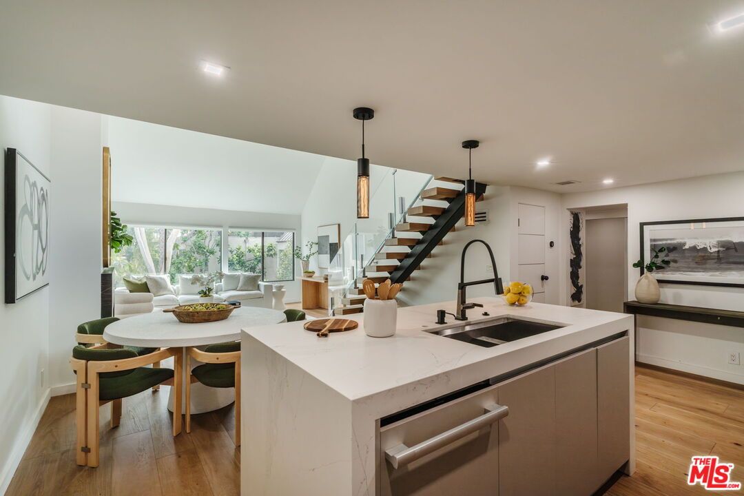 Dining room, Interior, Kitchen, Pendant Lights, Recessed Lighting, Stainless Steel Appliances, Wood Texture Flooring