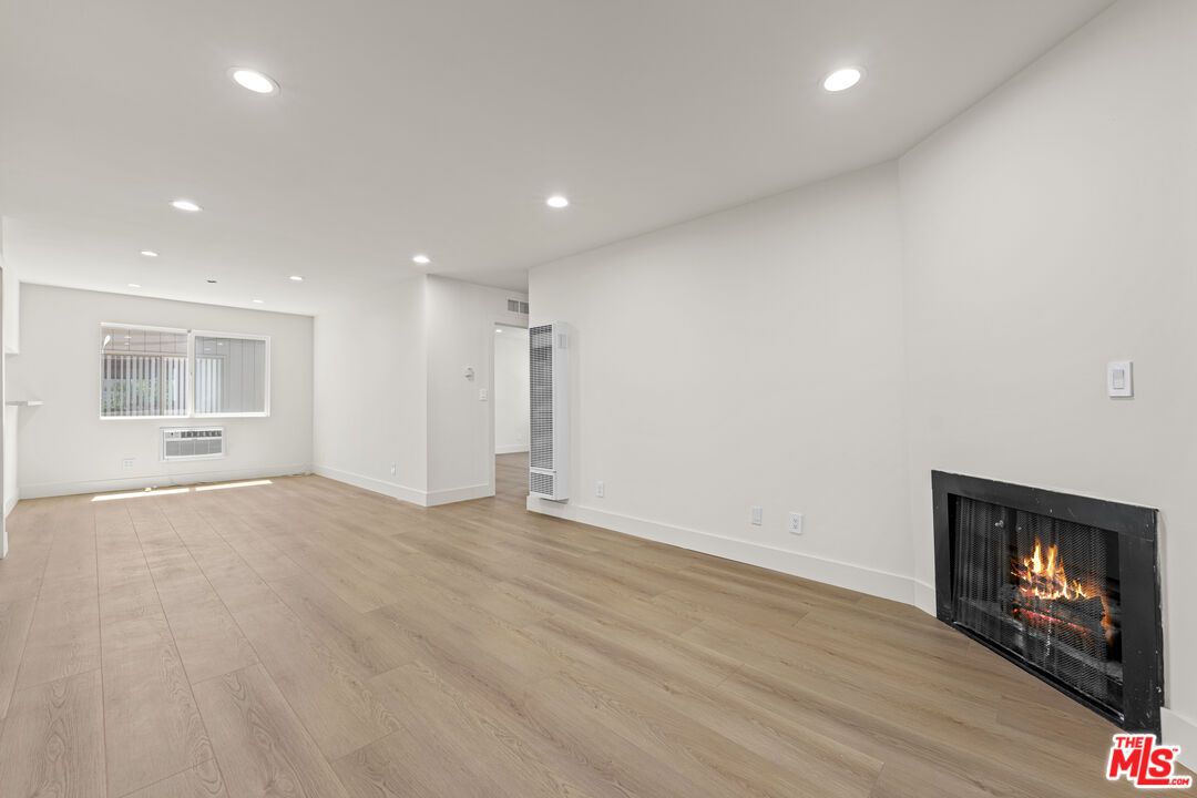Empty room, Fireplace, Interior, Recessed Lighting, Wood Texture Flooring