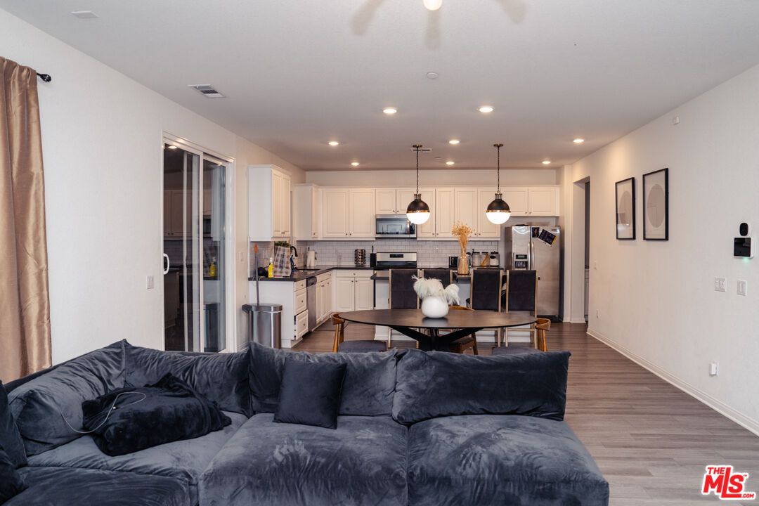 Interior, Kitchen, Living room, Pendant Lights, Recessed Lighting, Stainless Steel Appliances, Wood Texture Flooring
