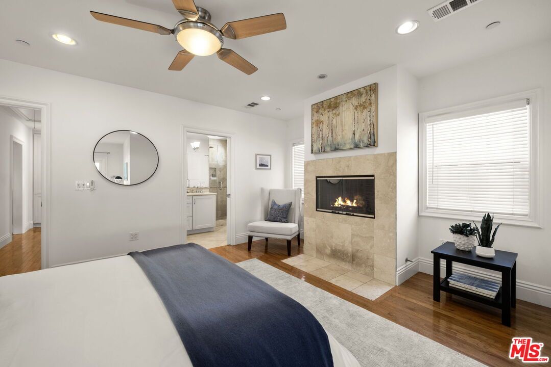 Bedroom, Fireplace, Interior, Recessed Lighting, Wood Texture Flooring