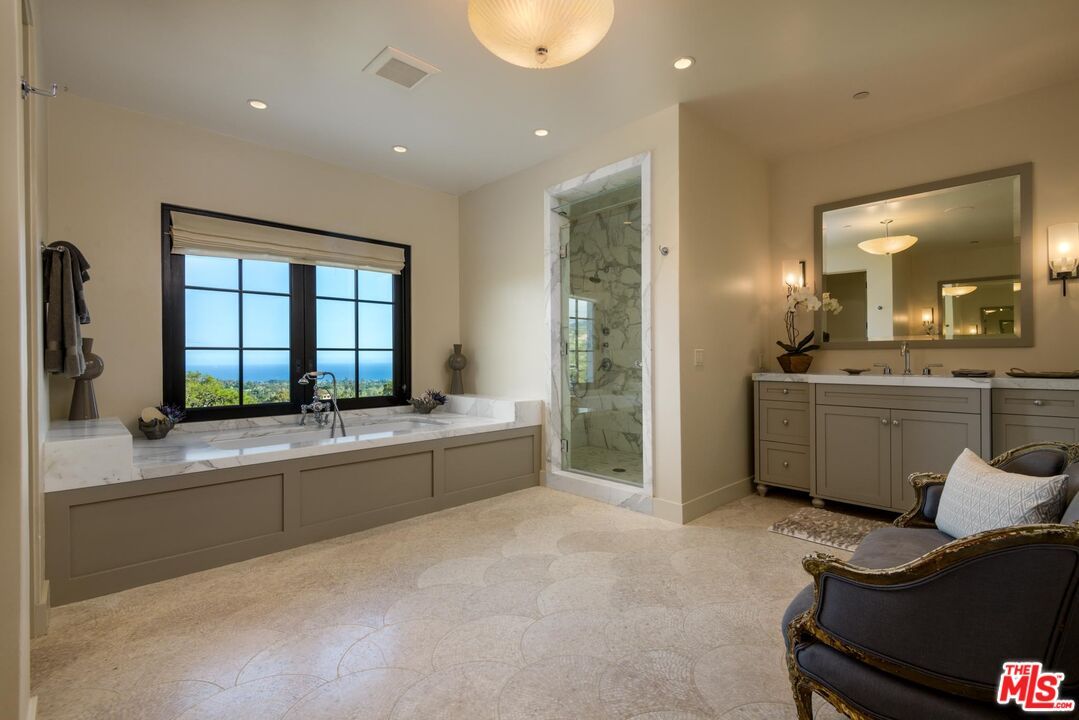 Bathroom, Dual Sink Vanities, Glass Shower, Interior, Marble Walls, Recessed Lighting, Water
