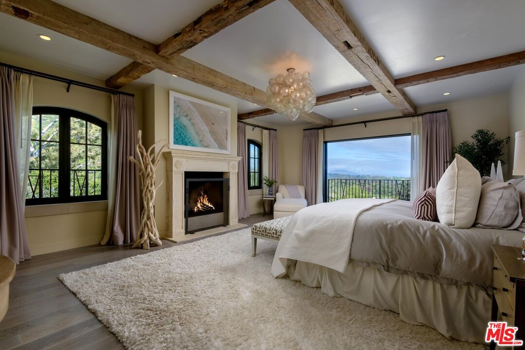 Bedroom, Chandelier, Fireplace, Interior, Recessed Lighting, Wooden Beams, Wood Texture Flooring