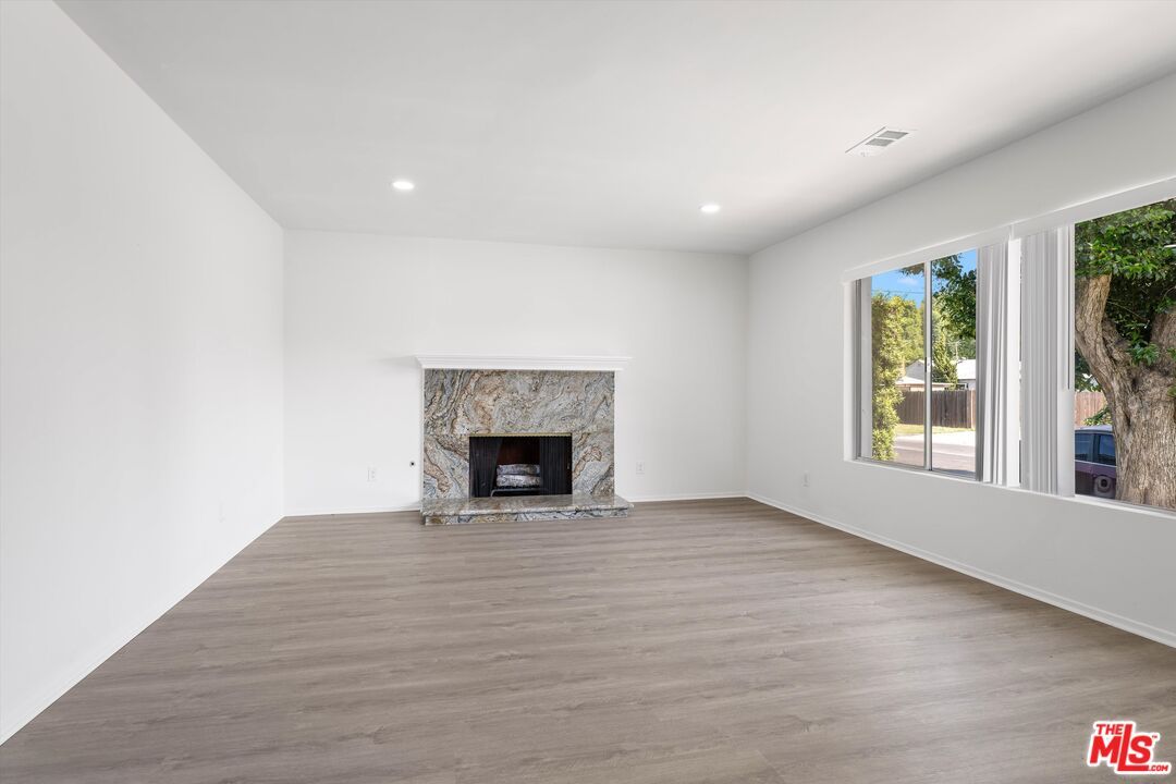 Empty room, Fireplace, Interior, Recessed Lighting, Wood Texture Flooring