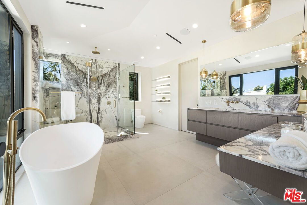Bathroom, Free Standing Baths, Glass Shower, Interior, Marble Walls, Pendant Lights, Recessed Lighting