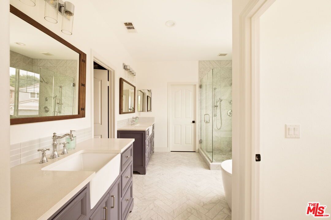 Bathroom, Dual Sink Vanities, Glass Shower, Interior, Marble Walls, Recessed Lighting