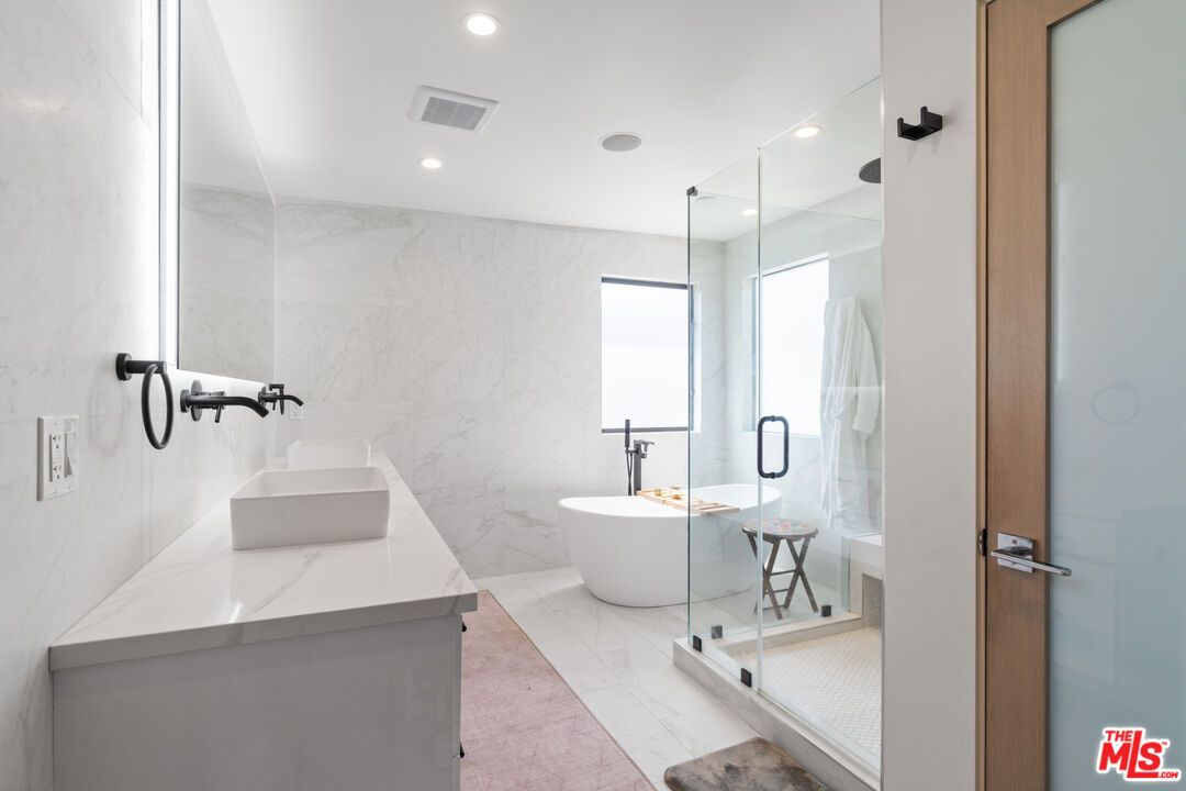 Bathroom, Dual Sink Vanities, Free Standing Baths, Glass Shower, Interior, Marble, Marble Walls, Recessed Lighting