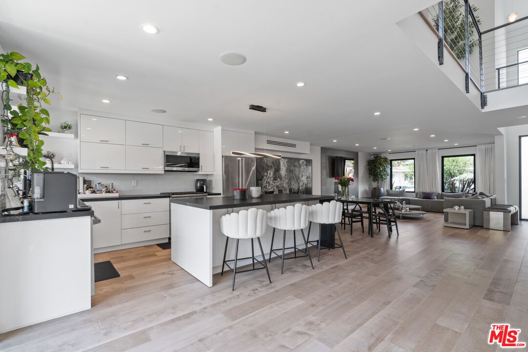 Dining room, Interior, Kitchen, Living room, Recessed Lighting, Stainless Steel Appliances, Wood Texture Flooring