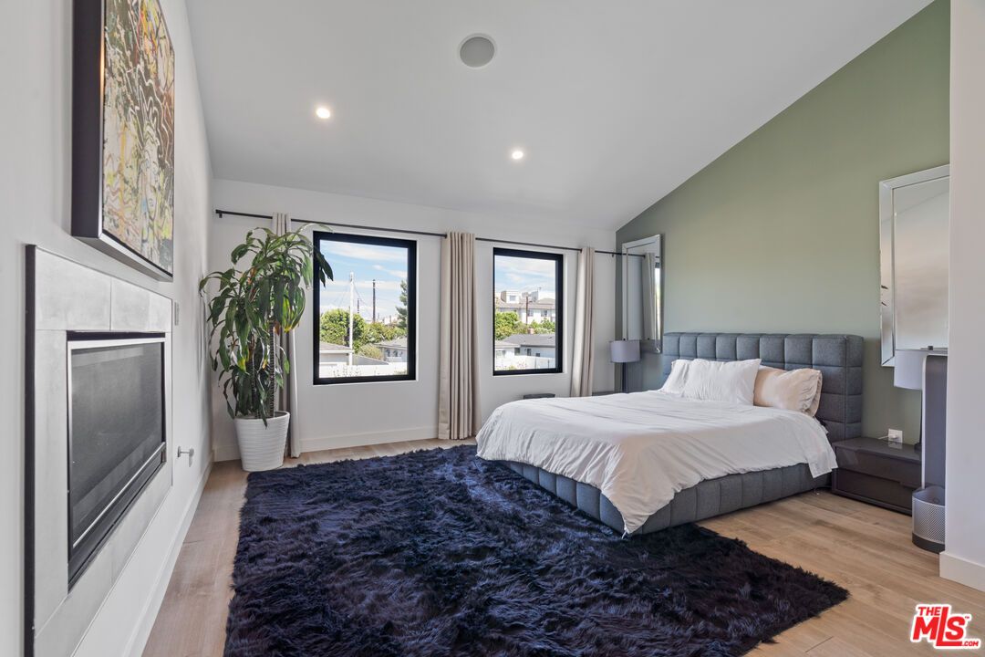 Bedroom, Fireplace, Interior, Recessed Lighting, Wood Texture Flooring