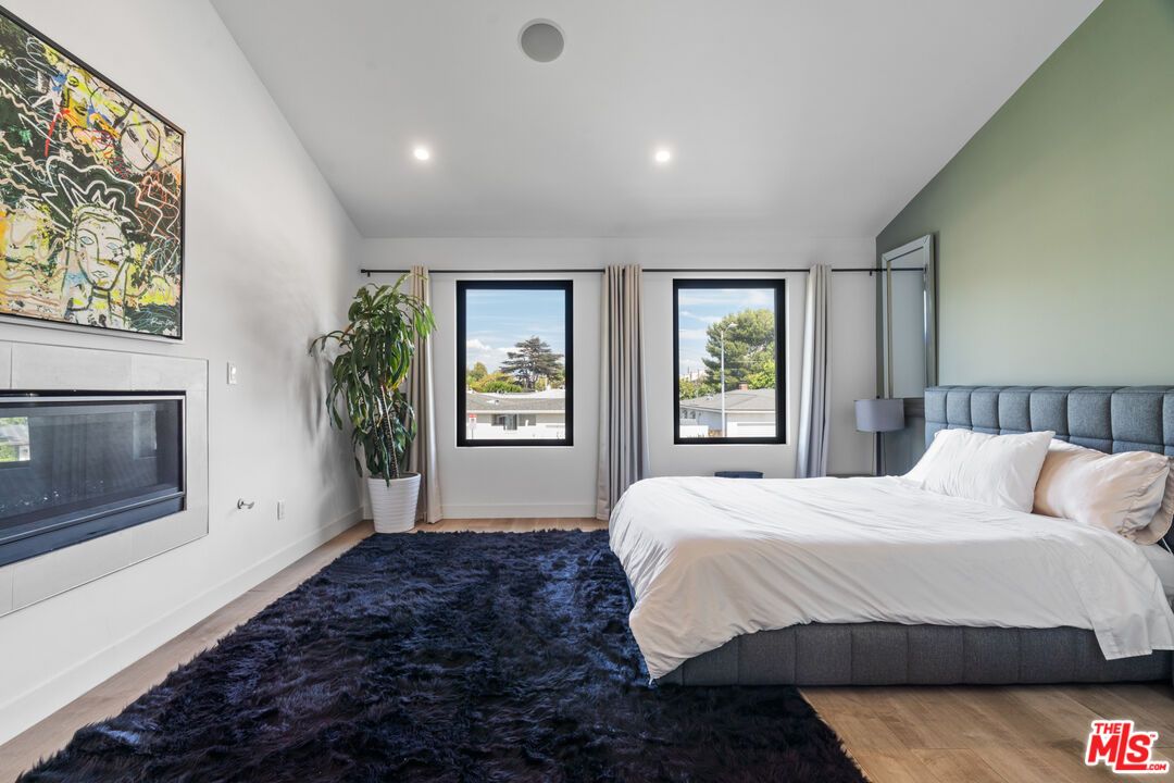 Bedroom, Fireplace, Interior, Recessed Lighting, Wood Texture Flooring