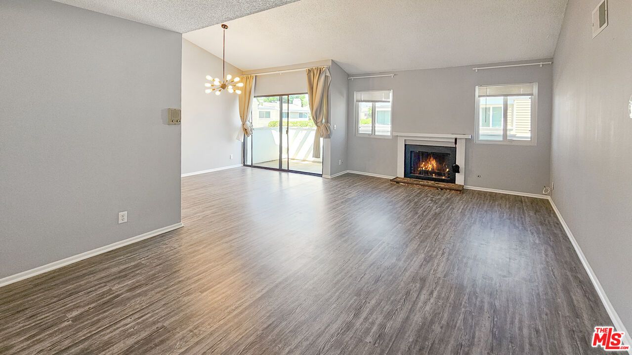 Empty room, Fireplace, Interior, Pendant Lights, Wood Texture Flooring