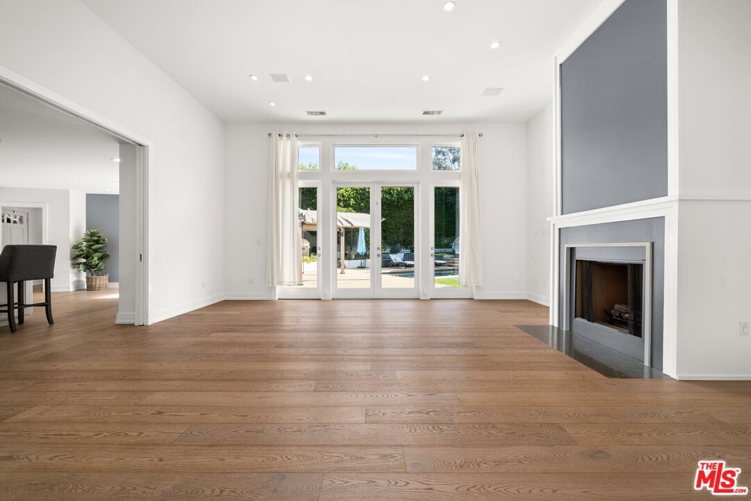 Empty room, Fireplace, Interior, Recessed Lighting, Wood Texture Flooring