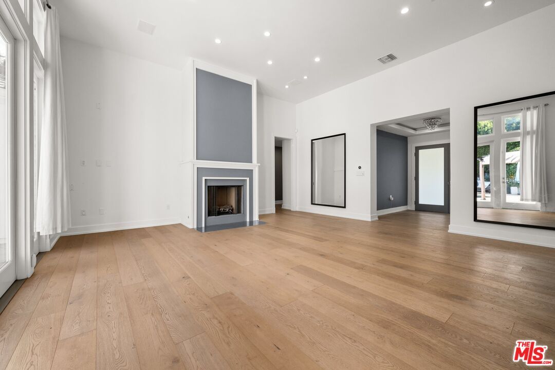Empty room, Fireplace, Interior, Recessed Lighting, Wood Texture Flooring