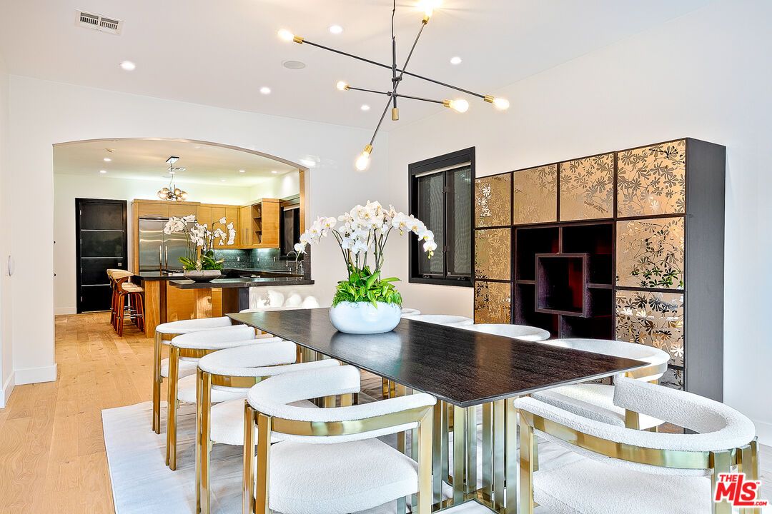 Dining room, Interior, Kitchen, Pendant Lights, Recessed Lighting, Stainless Steel Appliances, Wood Texture Flooring