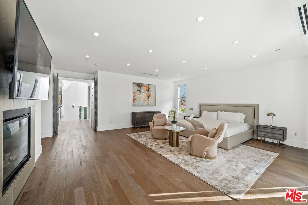 Bedroom, Fireplace, Interior, Recessed Lighting, Wood Texture Flooring