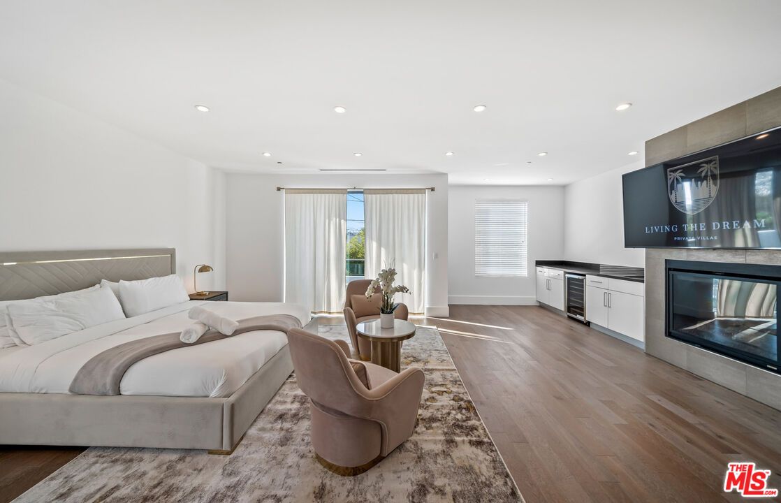 Bedroom, Fireplace, Interior, Living room, Recessed Lighting, Wood Texture Flooring