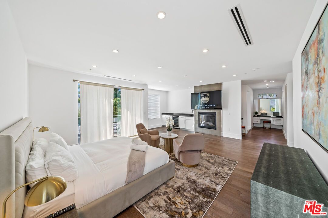 Bedroom, Fireplace, Interior, Recessed Lighting, Wood Texture Flooring