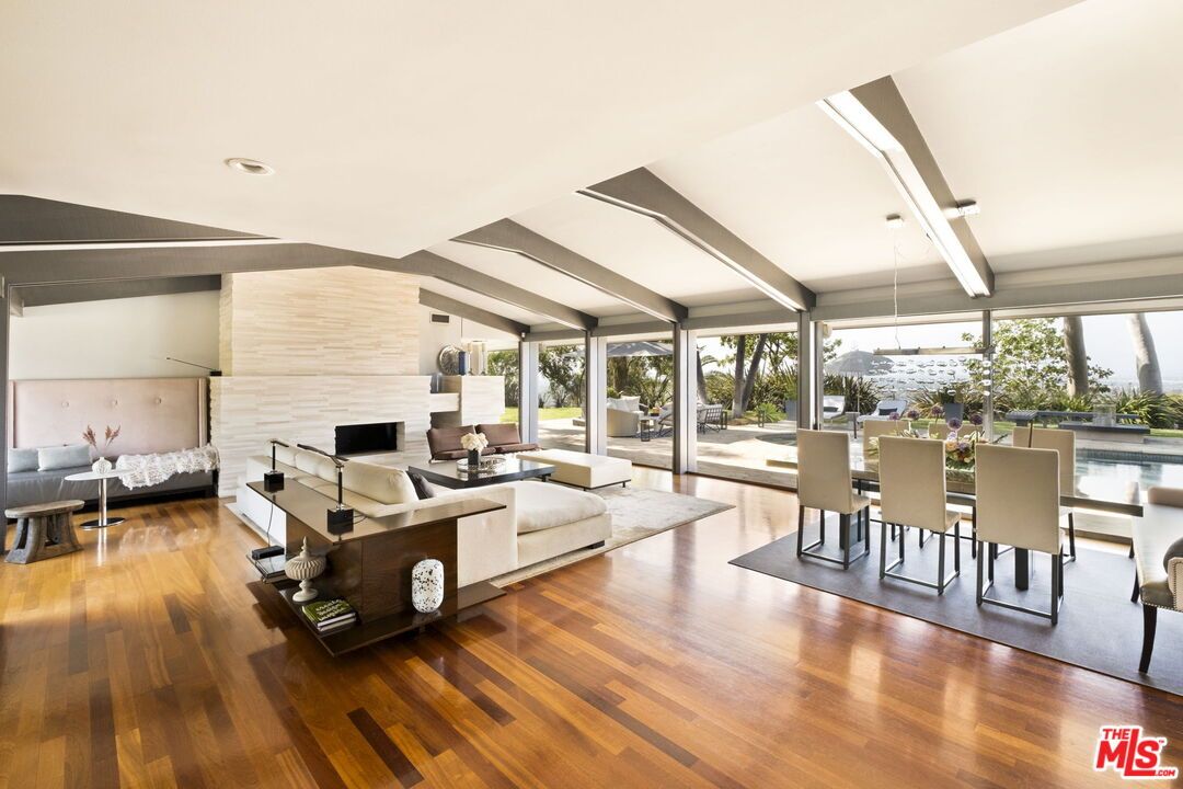 Dining room, Fireplace, Interior, Living room, Recessed Lighting, Wood Texture Flooring