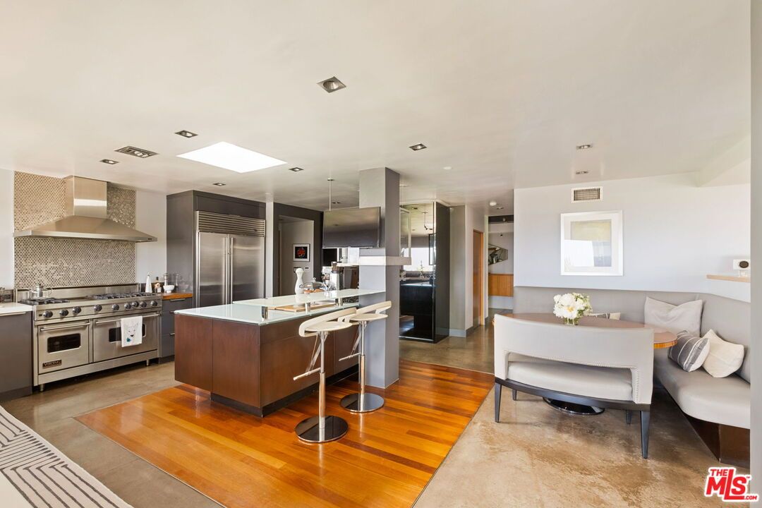 Dining room, Interior, Kitchen, Recessed Lighting, Stainless Steel Appliances, Wood Texture Flooring
