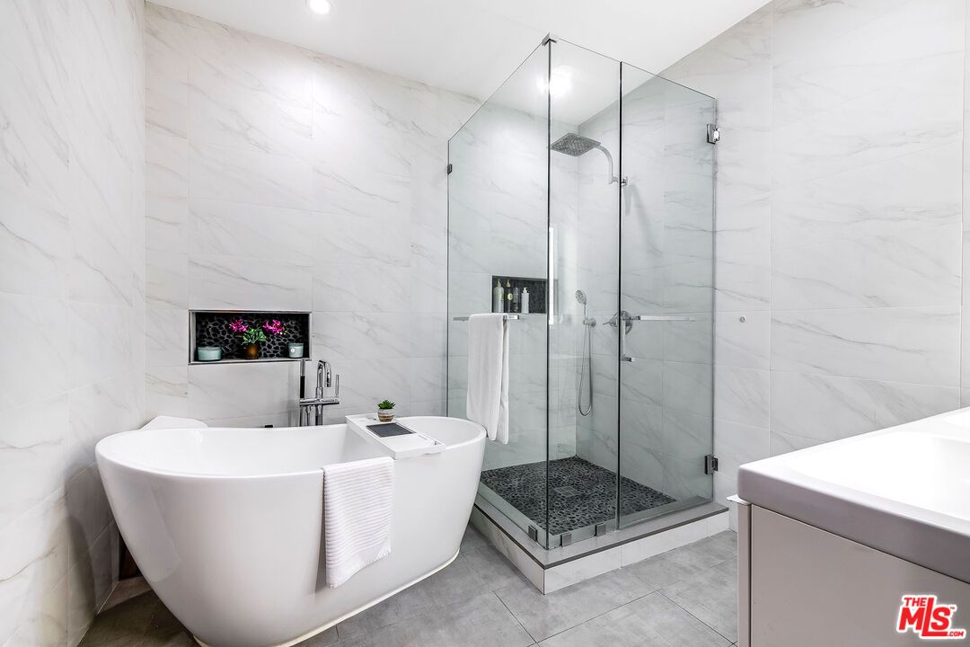 Bathroom, Free Standing Baths, Glass Shower, Interior, Marble Walls, Recessed Lighting