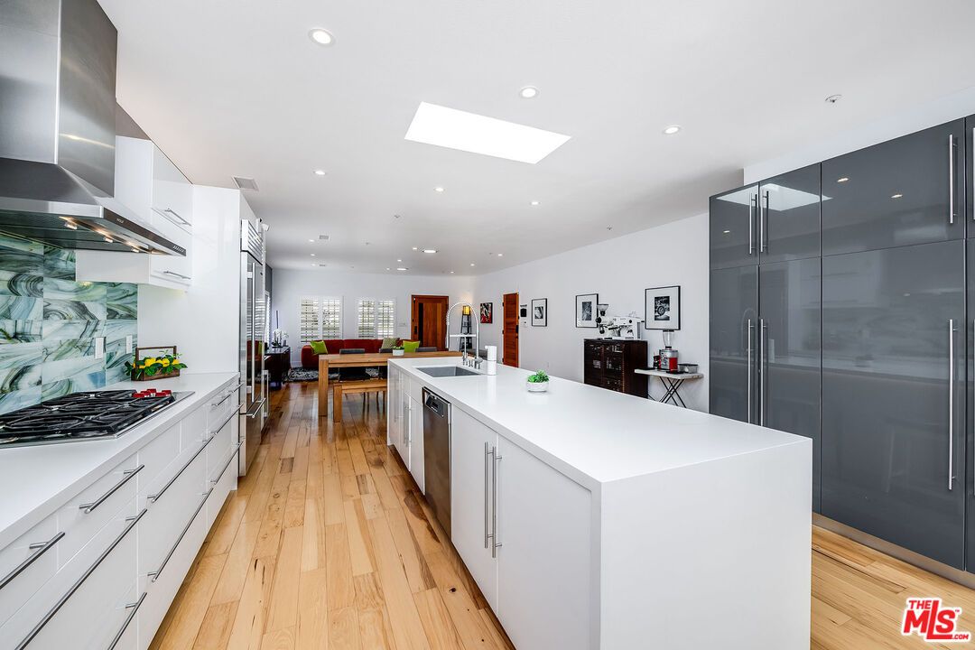 Dining room, Interior, Kitchen, Recessed Lighting, Stainless Steel Appliances, Wood Texture Flooring