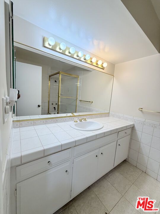 Bathroom, Dual Sink Vanities, Glass Shower, Interior, Tile Countertops