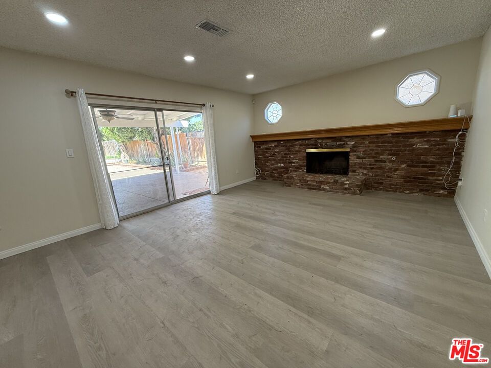 Empty room, Interior, Recessed Lighting, Stone Walls, Wood Texture Flooring