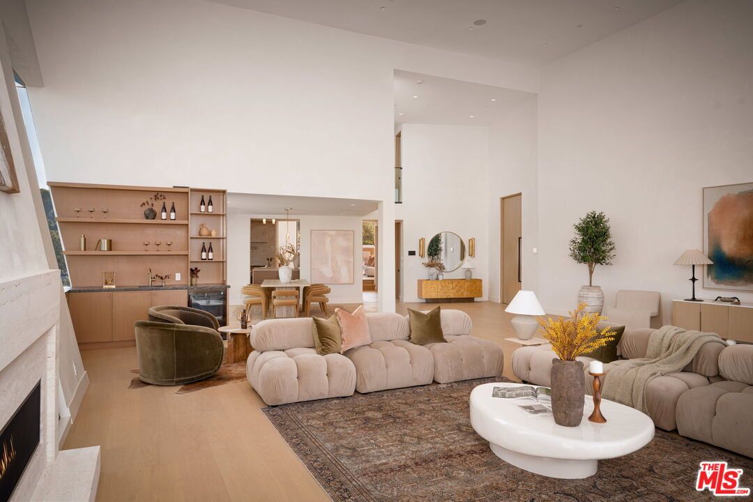 Dining room, Fireplace, Interior, Living room, Pendant Lights, Recessed Lighting, Wood Texture Flooring