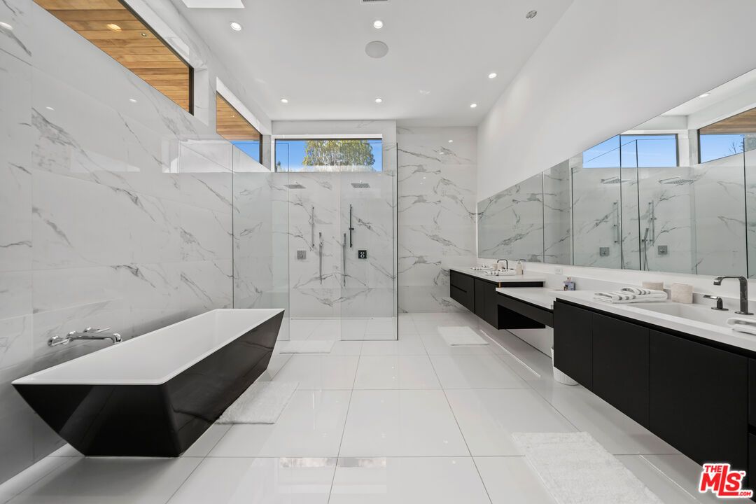 Bathroom, Dual Sink Vanities, Free Standing Baths, Glass Shower, Interior, Marble Walls, Recessed Lighting