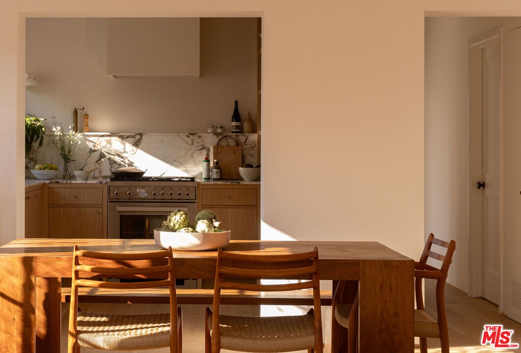 Dining room, Interior, Kitchen, Marble Walls, Stainless Steel Appliances, Wood Texture Flooring