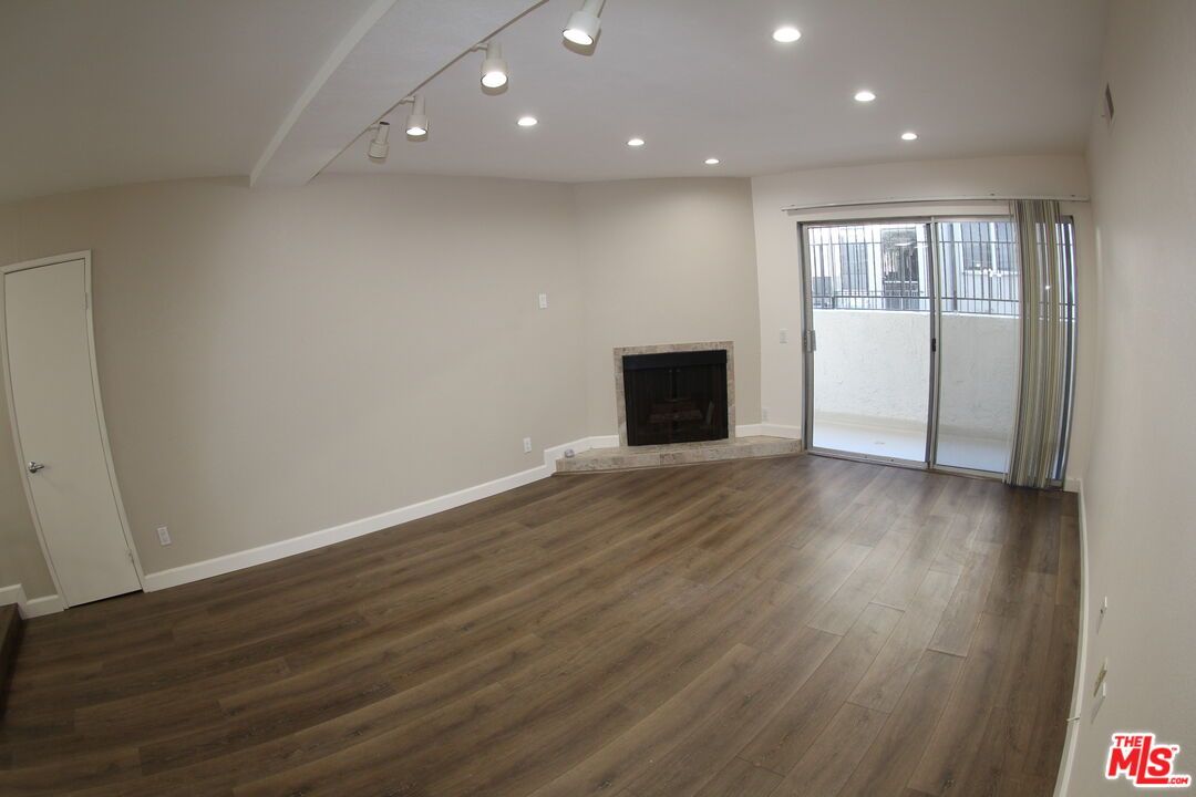Empty room, Fireplace, Interior, Recessed Lighting, Wood Texture Flooring